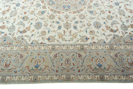 Corner detail of New Kashan rug showing border pattern and Wool pile