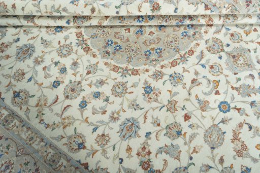 Close-up detail of New Kashan rug from Iran / Persia showing Wool weave