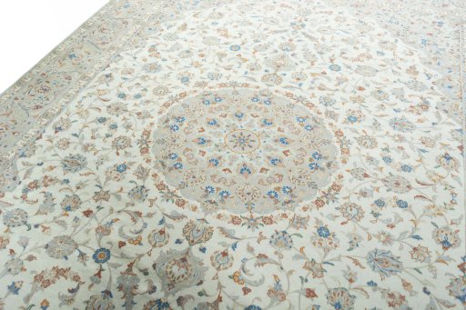 Backside of handmade New Kashan rug showing knot structure and weave density