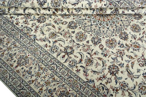 Close-up detail of 2000s Kashan rug from Iran / Persia showing Wool weave