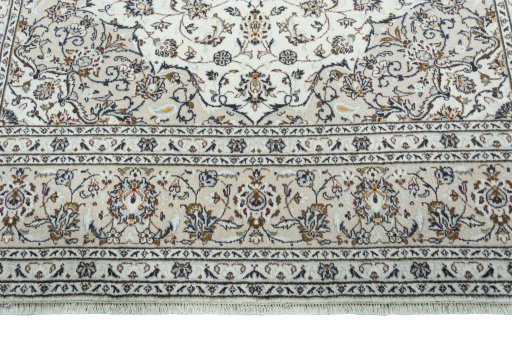 Close-up detail of 2000s Kashan rug from Iran / Persia showing Wool weave