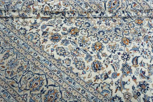 Close-up detail of 2000s Kashan rug from Iran / Persia showing Wool weave