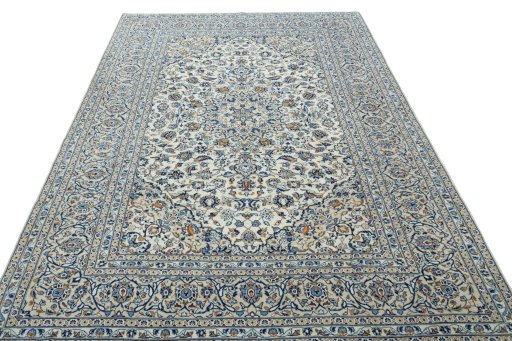 Surface texture of 2000s Kashan rug with natural Wool and intricate pattern