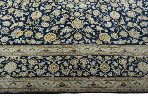Corner detail of 1970s Kashan rug showing border pattern and Wool pile
