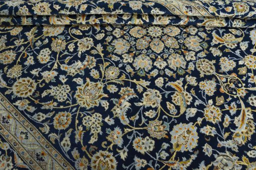 Close-up detail of 1970s Kashan rug from Iran / Persia showing Wool weave