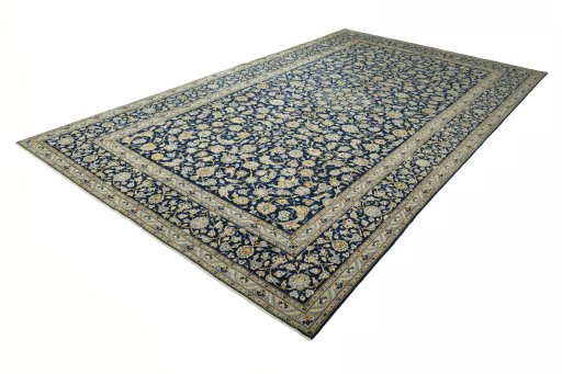 Corner detail of 1970s Kashan rug showing border pattern and Wool pile