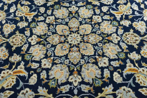 Central medallion detail of 1970s Kashan rug from Iran / Persia