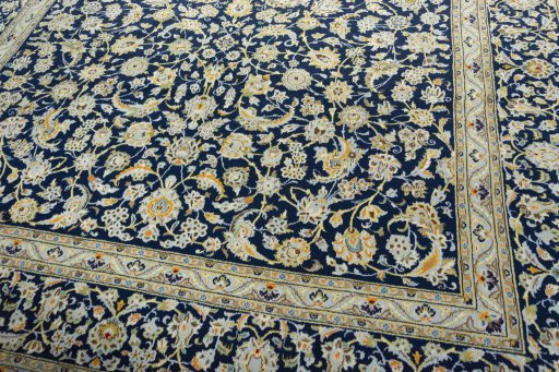 Close-up detail of 1970s Kashan rug from Iran / Persia showing Wool weave
