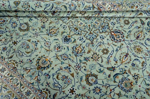 Close-up detail of 2000s Kashan rug from Iran / Persia showing Wool weave