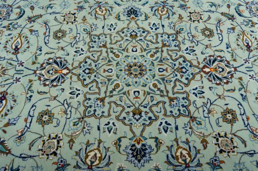 Central medallion detail of 2000s Kashan rug from Iran / Persia