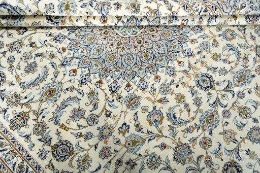 Close-up detail of 2000s Kashan rug from Iran / Persia showing Wool weave