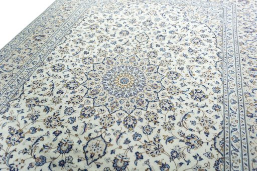 Backside of handmade 2000s Kashan rug showing knot structure and weave density