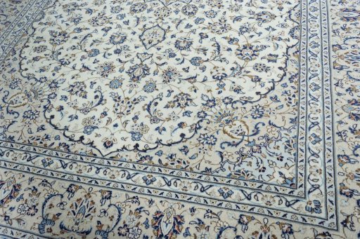 Close-up detail of 2000s Kashan rug from Iran / Persia showing Wool weave