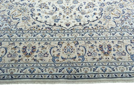 Full view of 2000s Kashan rug from Iran / Persia, 403 × 289 cm in Beige tones