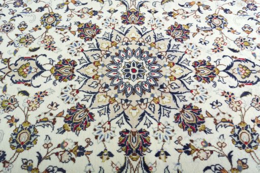 Central medallion detail of 2000s Kashan rug from Iran / Persia