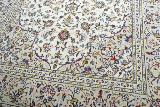 Close-up detail of 2000s Kashan rug from Iran / Persia showing Wool weave
