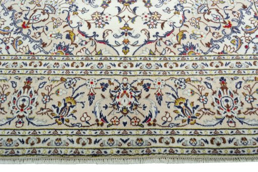 Full view of 2000s Kashan rug from Iran / Persia, 307 × 193 cm in Beige tones
