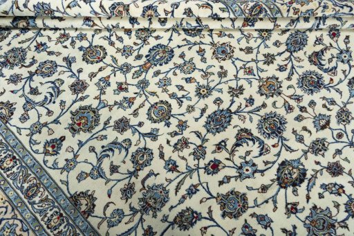Close-up detail of 2000s Kashan rug from Iran / Persia showing Wool weave
