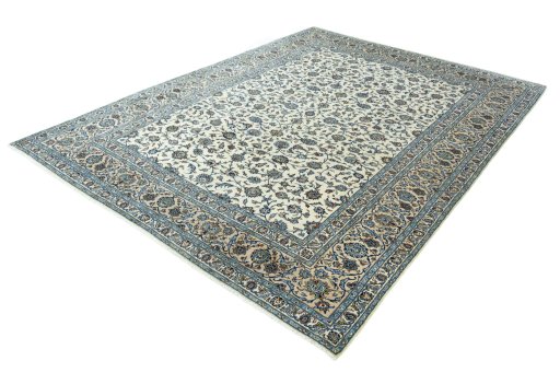 Corner detail of 2000s Kashan rug showing border pattern and Wool pile