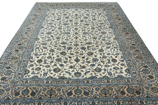 Surface texture of 2000s Kashan rug with natural Wool and intricate pattern