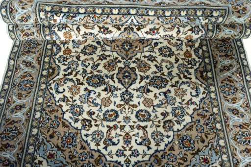 Close-up detail of 2000s Kashan rug from Iran / Persia showing Wool weave