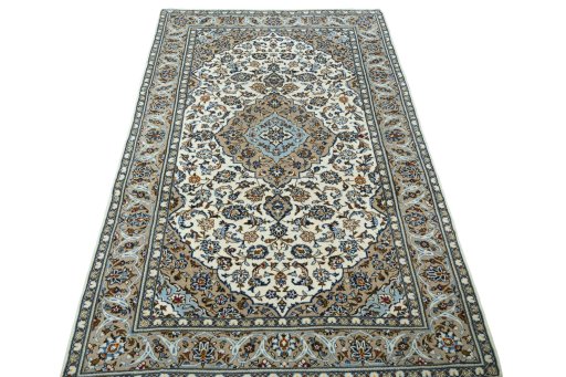 Surface texture of 2000s Kashan rug with natural Wool and intricate pattern