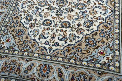 Close-up detail of 2000s Kashan rug from Iran / Persia showing Wool weave
