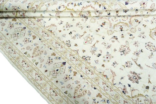 Close-up detail of New Kashan rug from Iran / Persia showing Wool weave