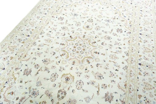 Backside of handmade New Kashan rug showing knot structure and weave density