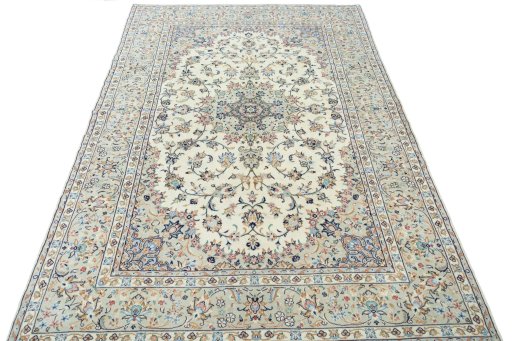 Surface texture of 2000s Kashan rug with natural Wool and intricate pattern