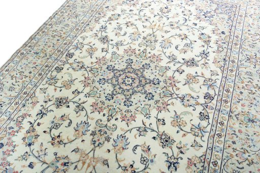 Backside of handmade 2000s Kashan rug showing knot structure and weave density