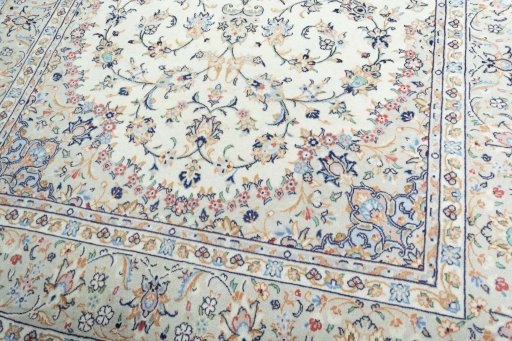 Close-up detail of 2000s Kashan rug from Iran / Persia showing Wool weave