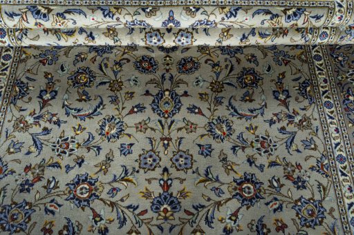 Close-up detail of 2000s Kashan rug from Iran / Persia showing Wool weave
