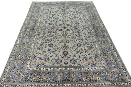 Surface texture of 2000s Kashan rug with natural Wool and intricate pattern