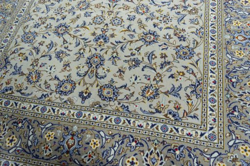 Close-up detail of 2000s Kashan rug from Iran / Persia showing Wool weave
