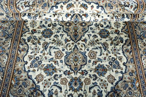 Close-up detail of 2000s Kashan rug from Iran / Persia showing Wool weave