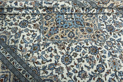 Close-up detail of 2000s Kashan rug from Iran / Persia showing Wool weave