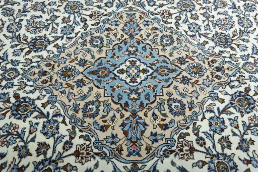 Central medallion detail of 2000s Kashan rug from Iran / Persia