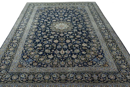 Surface texture of 2000s Kashan rug with natural Wool and intricate pattern