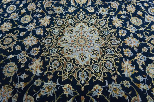 Central medallion detail of 2000s Kashan rug from Iran / Persia