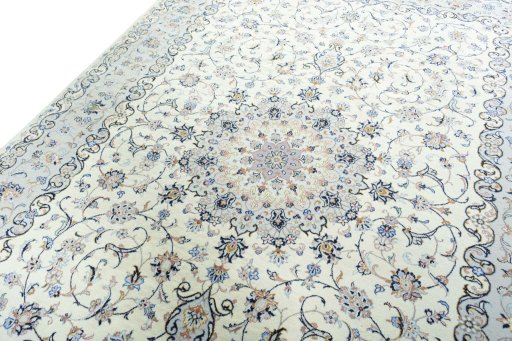 Backside of handmade New Kashan rug showing knot structure and weave density
