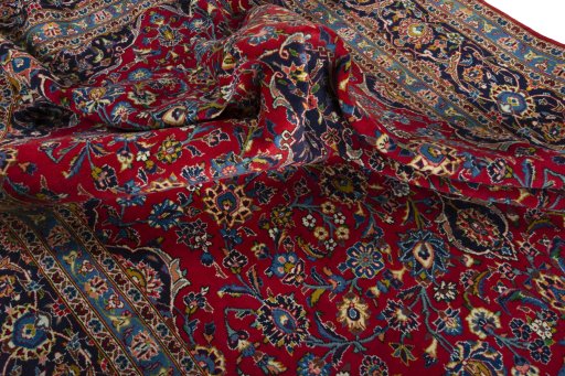 Surface texture of 2000s Kashan rug with natural Wool and intricate pattern