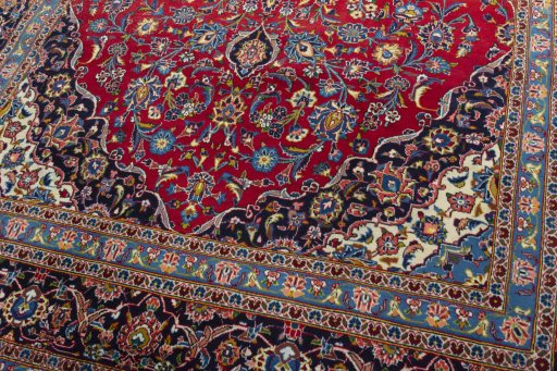 Close-up detail of 2000s Kashan rug from Iran / Persia showing Wool weave
