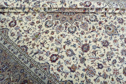 Close-up detail of 2000s Kashan rug from Iran / Persia showing Wool weave