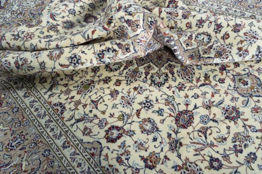 Surface texture of 2000s Kashan rug with natural Wool and intricate pattern