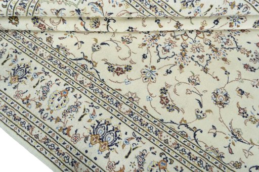 Close-up detail of 2000s Kashan rug from Iran / Persia showing Wool weave