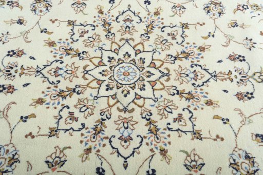 Central medallion detail of 2000s Kashan rug from Iran / Persia