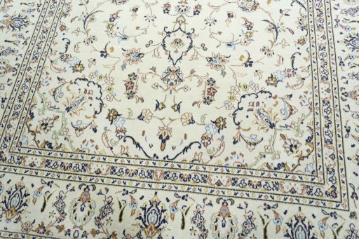 Close-up detail of 2000s Kashan rug from Iran / Persia showing Wool weave