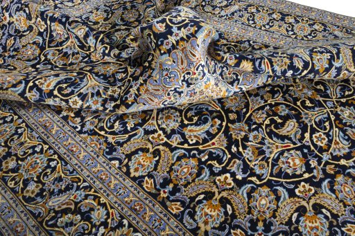 Surface texture of 2000s Kashan rug with natural Wool and intricate pattern
