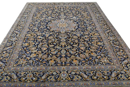 Surface texture of 2000s Kashan rug with natural Wool and intricate pattern